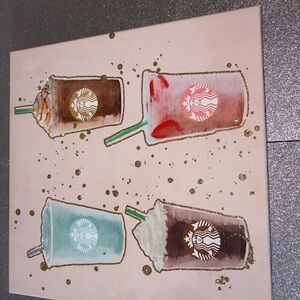 Starbucks Art with Red, Blue, and Brown Drinks
